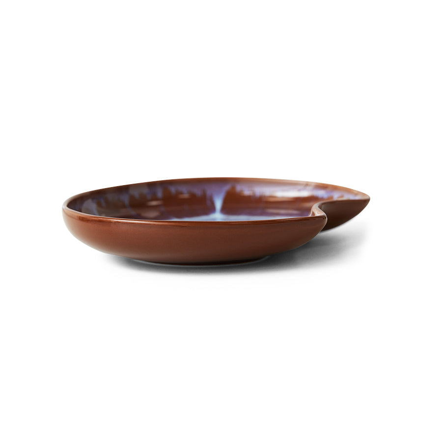 brown and blue organic shape ceramic plate