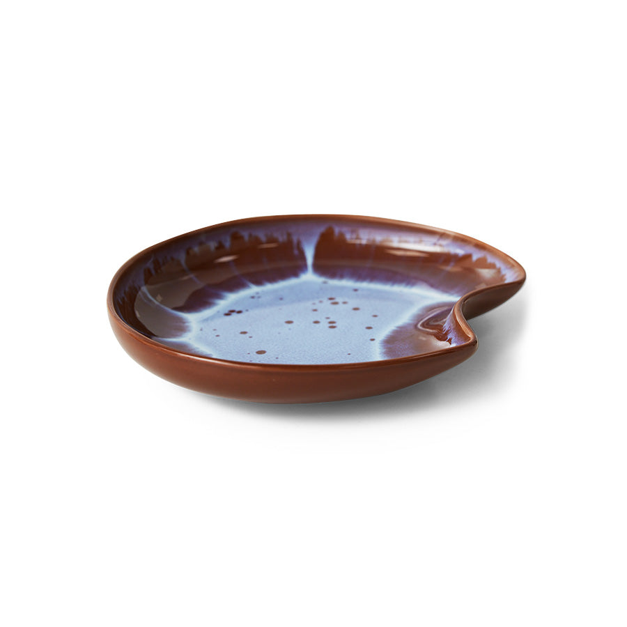 brown and blue organic shape ceramic plate