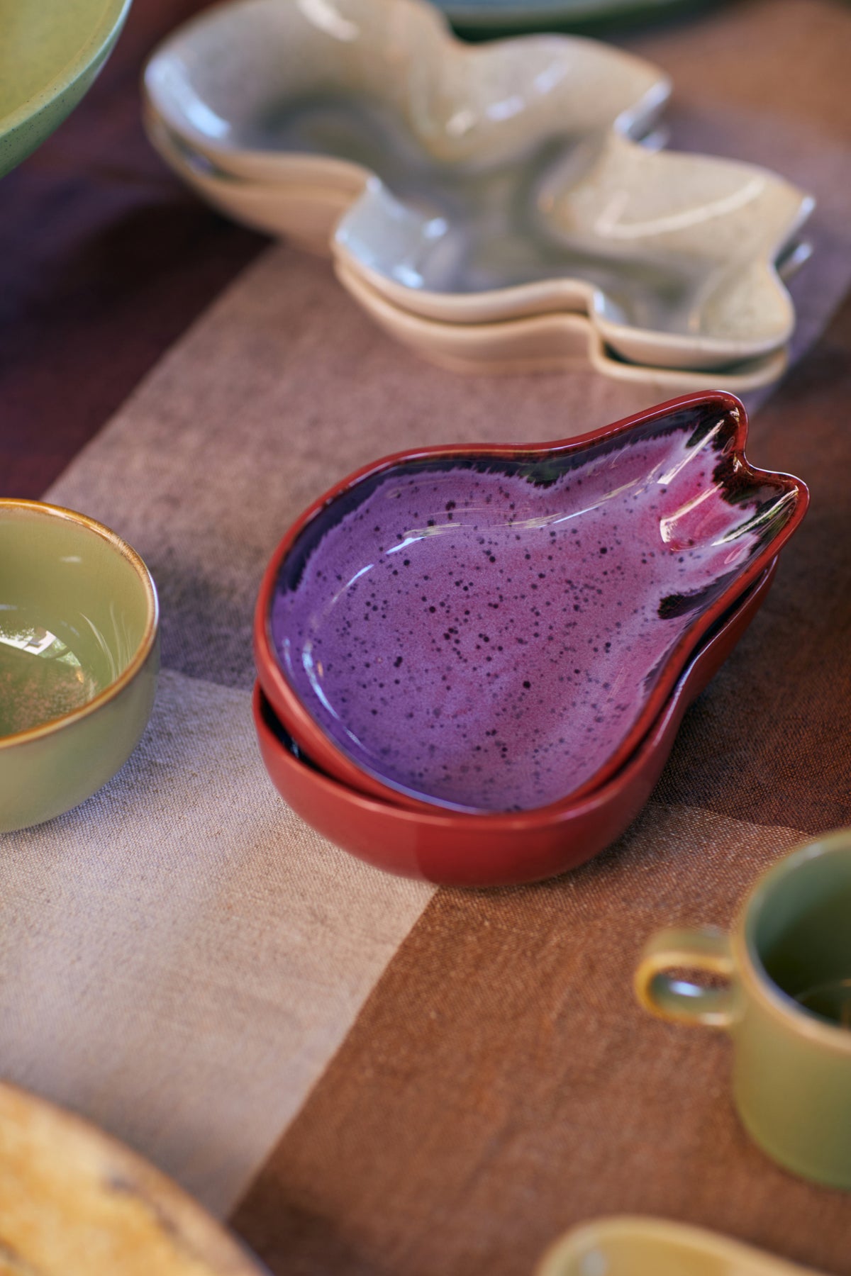 purple and red toned dragon fruit ceramic bowl