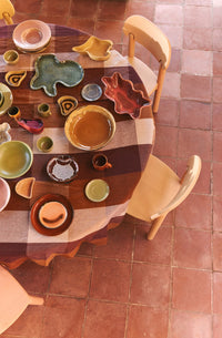 round table with colored  shell ceramics