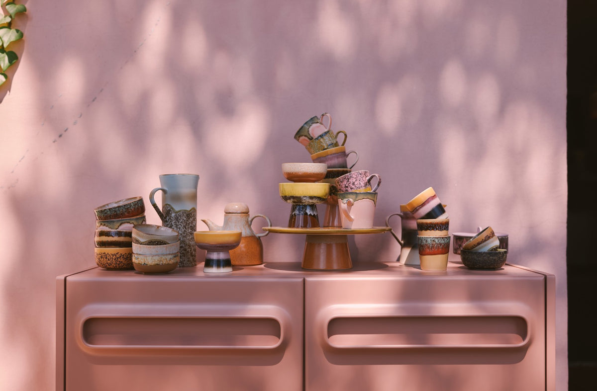 70s ceramics on pink cabinet