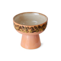 peach colored tapas bowl on base