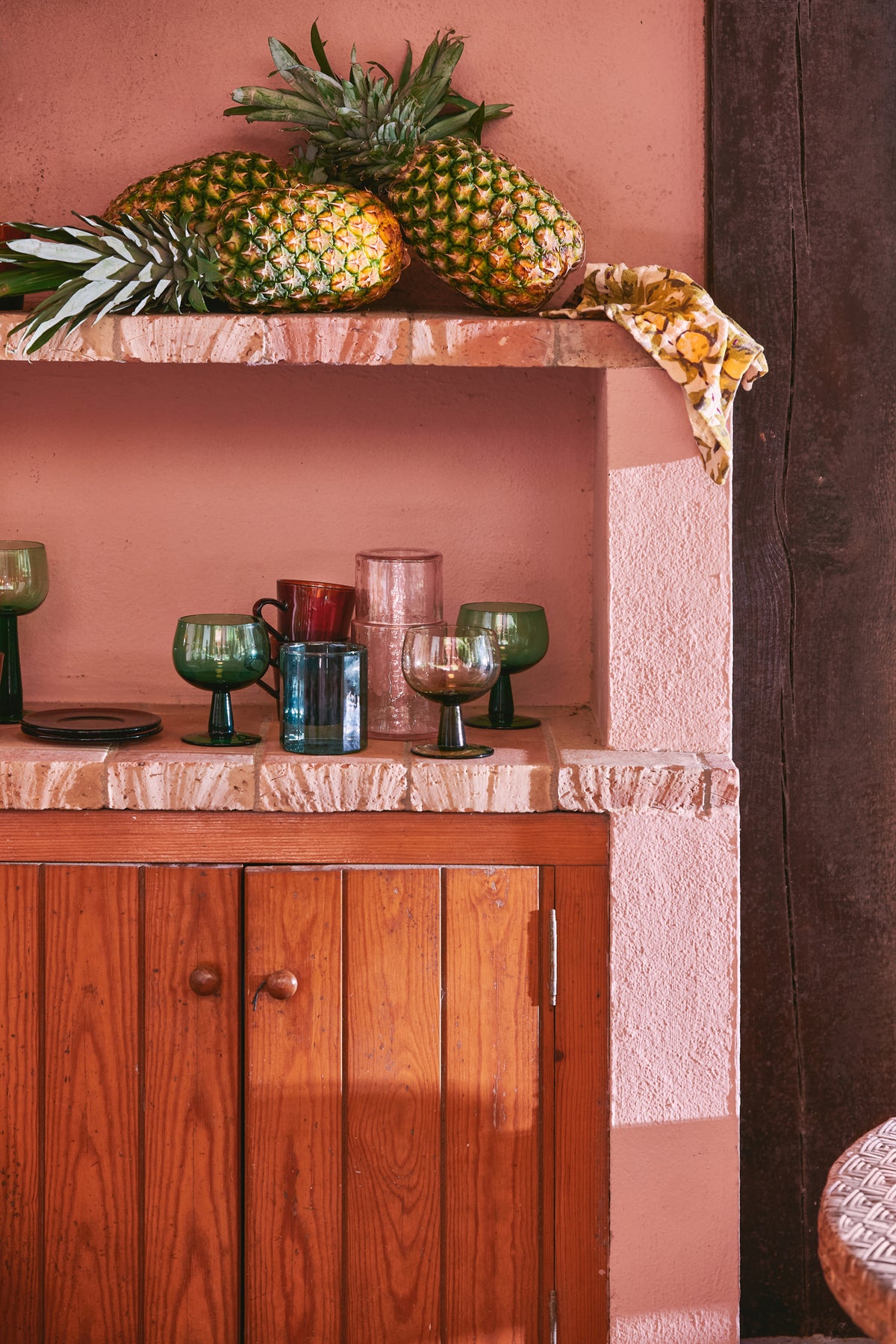 outdoor cabinet with colorful glassware