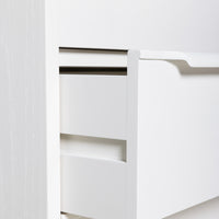 detail of white wooden dresser with 5 drawers