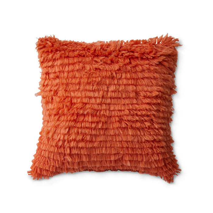 red fluffy textured pillow