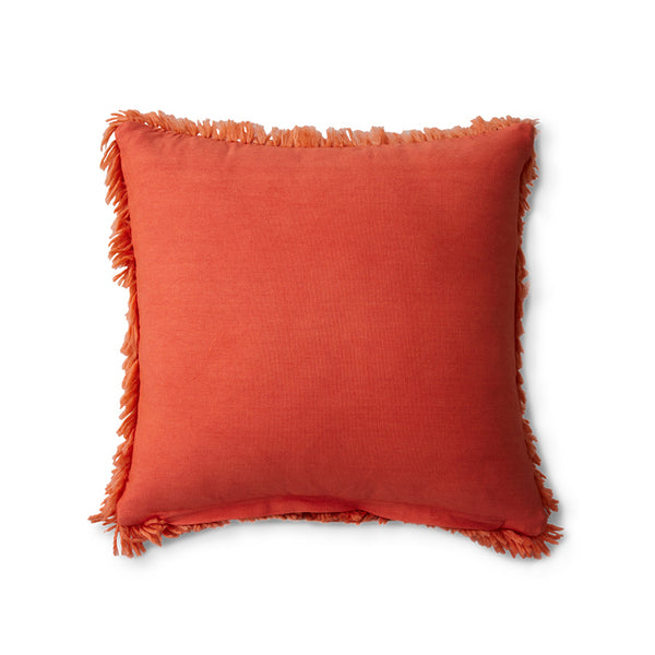 red fluffy textured pillow