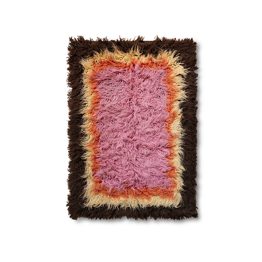 brown yellow orange and pink fluffy rug