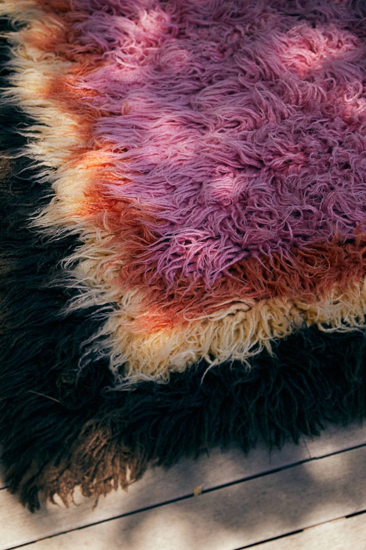 brown yellow orange and pink fluffy rug