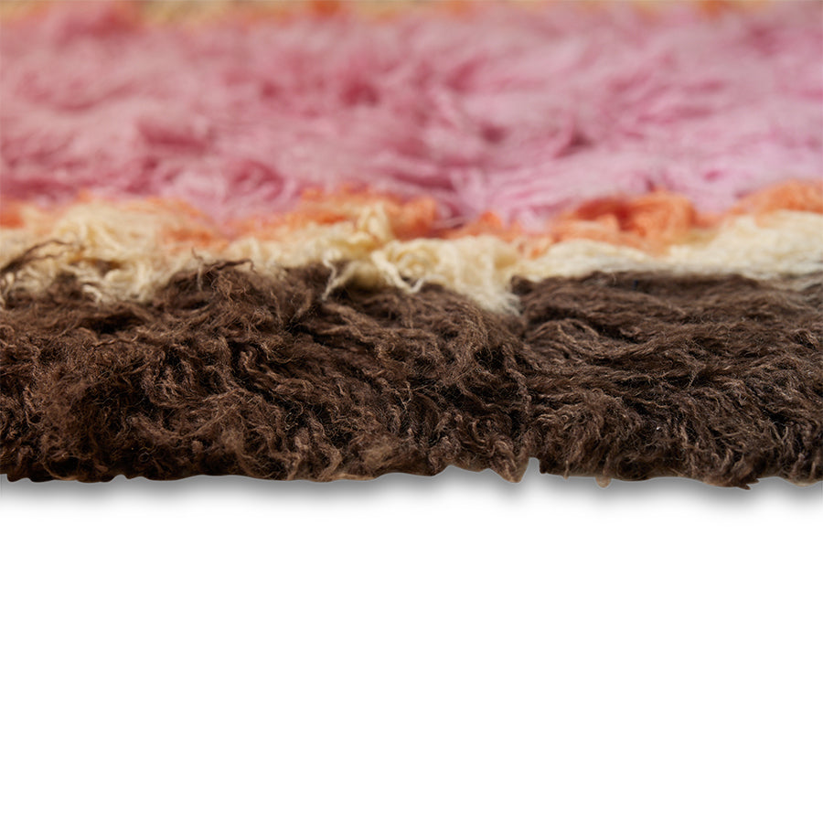 brown yellow orange and pink fluffy rug