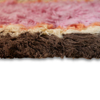 brown yellow orange and pink fluffy rug