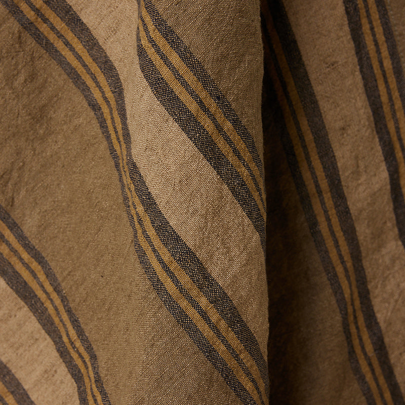 Close-up of brown fabric with striped pattern