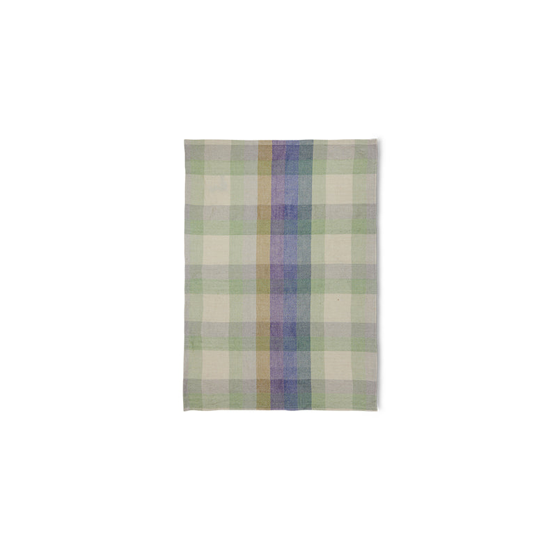 Plaid fabric swatch with green, purple, and beige colors on a white background