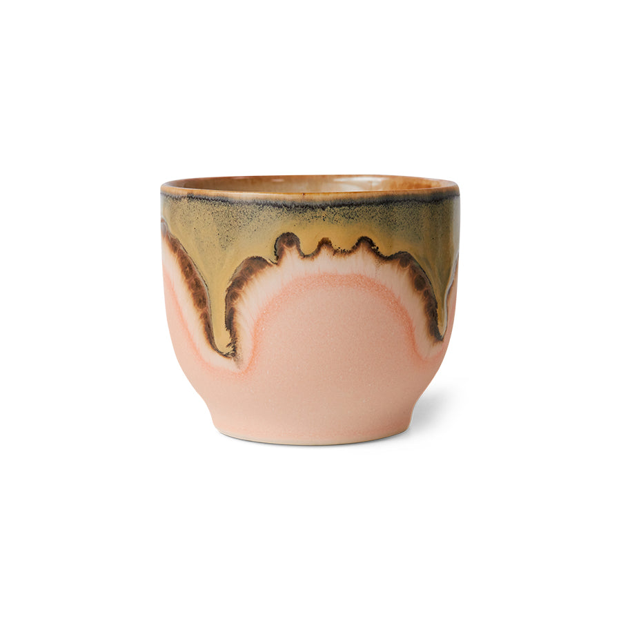 Ceramic cup with unique design on a white background