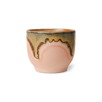 Ceramic cup with unique design on a white background