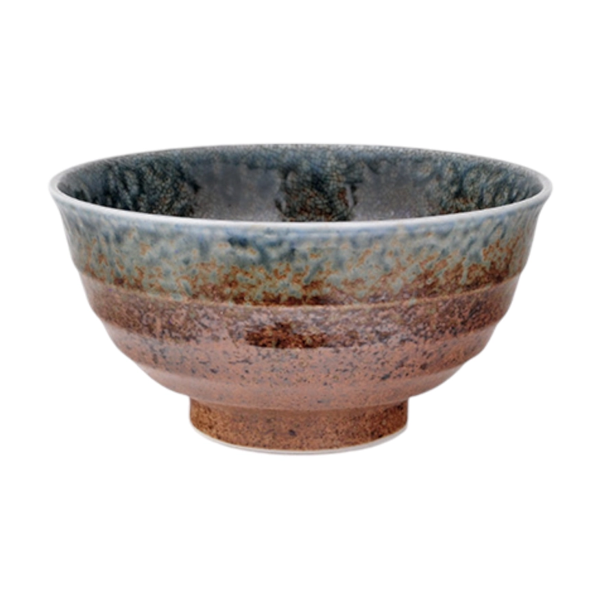 Ceramic bowl with a textured surface on a white background