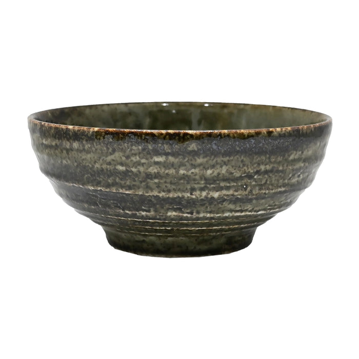 Dark green ceramic bowl on a white background