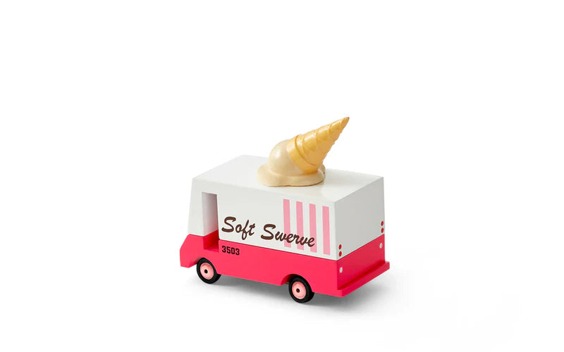 Toy ice cream truck with a cone on top against a white background