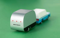 Model of a trailer with 'Airstream' branding on a green background