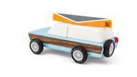 Toy car with a retro design on a white background