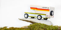 Toy truck with 'Honey' branding on a white background