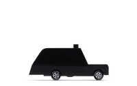 Black silhouette of a vehicle on a white background