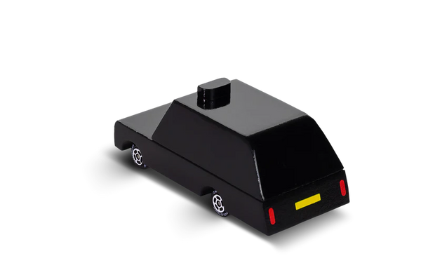 Black toy car with red and yellow details on a white background