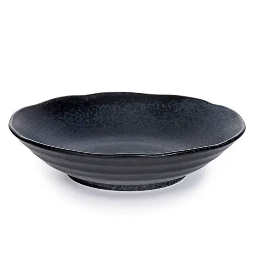 Black ceramic bowl on a white background