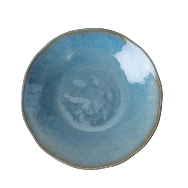 Blue ceramic plate on a white surface