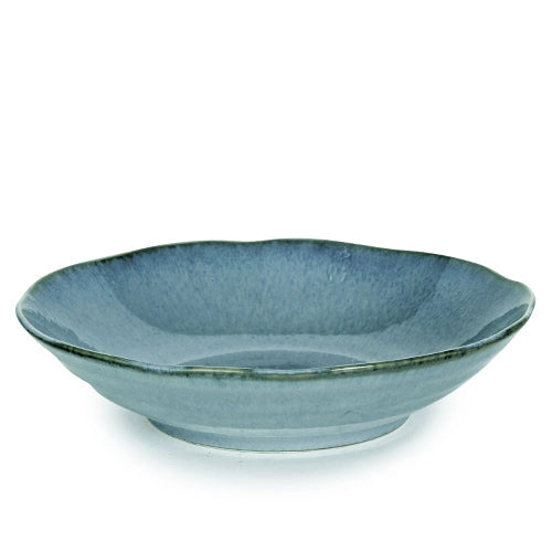 Blue ceramic bowl on a white background