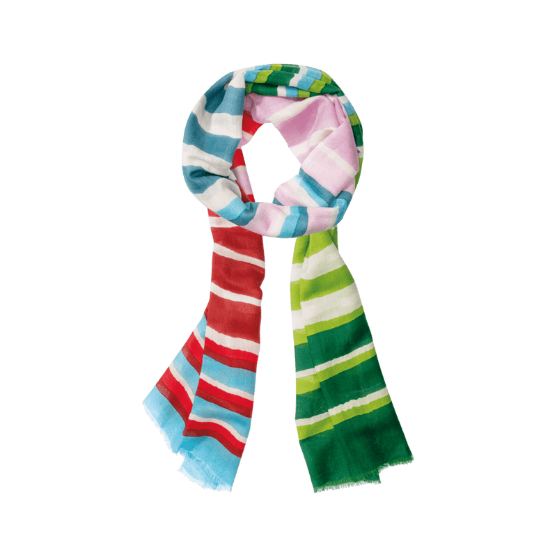 Colorful striped scarf on a green background