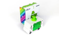 White and green toy with colorful packaging on a white background