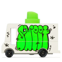 Toy truck with green cartoon characters on a white background