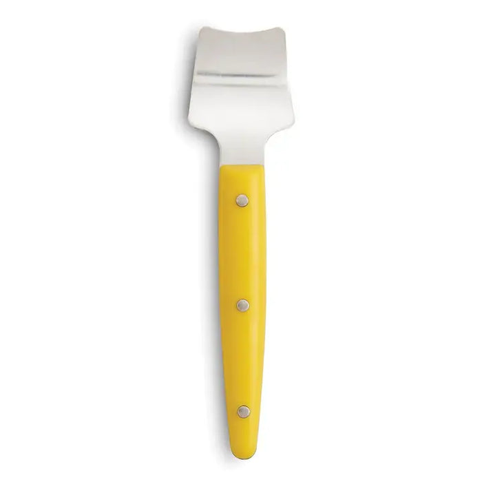 Yellow corn butter knife with a silver head on a white background