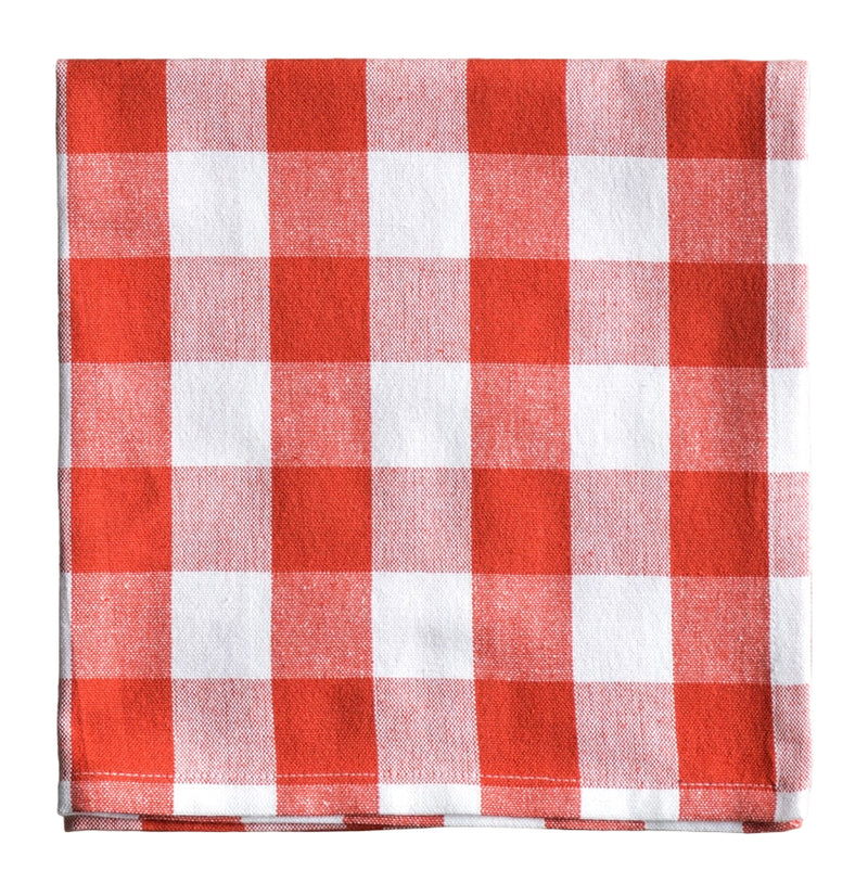 Red and white checkered napkin on a white surface