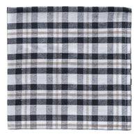 Plaid fabric napkin with black, white, and gray colors on a white background
