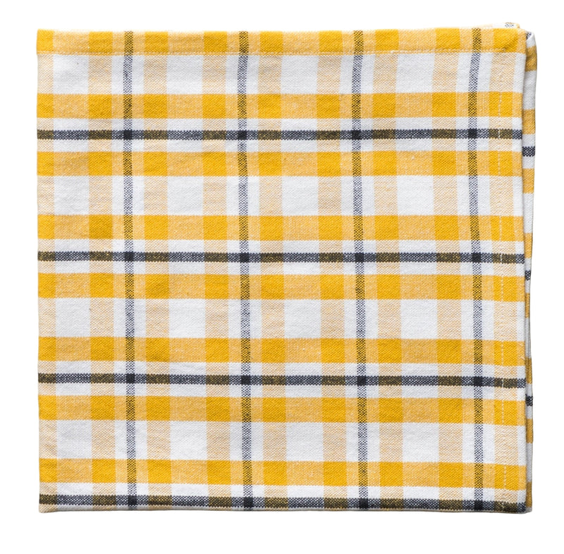 Yellow and white checkered fabric on a white background