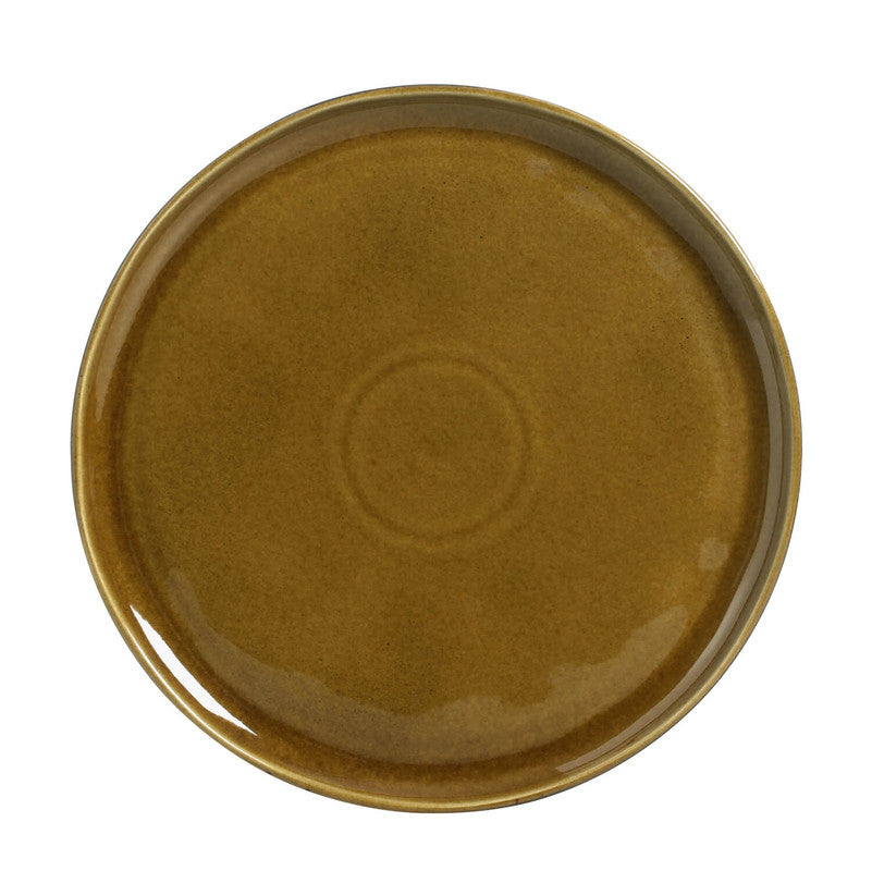 amber colored round side plate on white bacjkground
