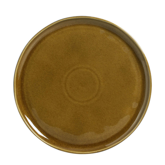 amber colored round side plate on white bacjkground