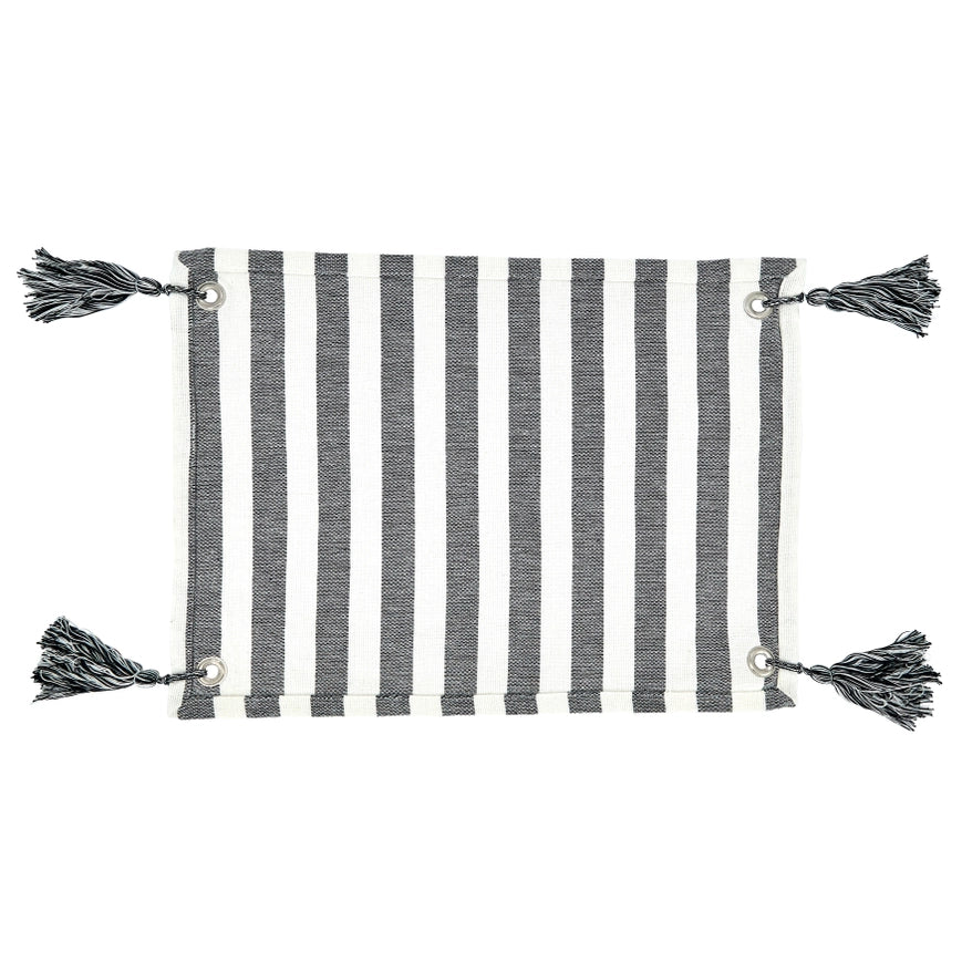 Striped fabric with tassels on a white background