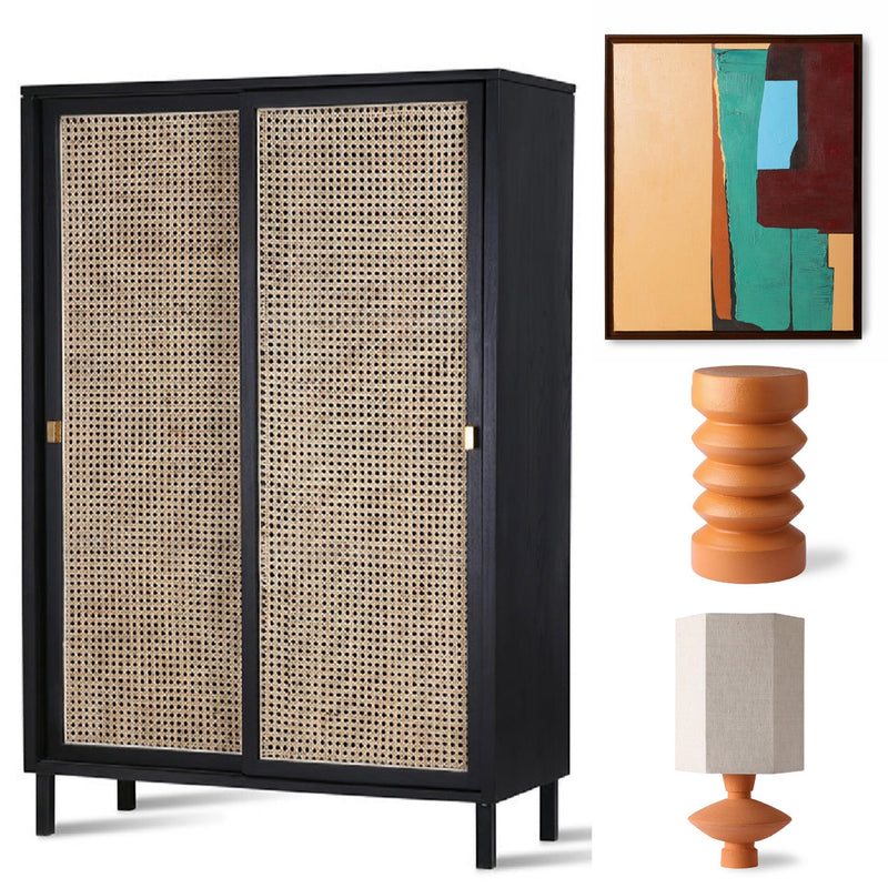 black cabinet with sliding doors, abstract painting and orange terra accent table and table lamp