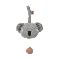 Gray knitted  koala-shaped toy with a brown ball on a white background