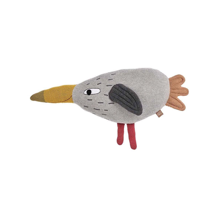 Plush toy shaped like a bird with a gray body, yellow beak, and red legs on a white background