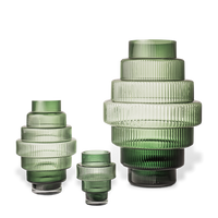green mouth blown steps vases