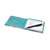 Notebook with a pen on a white background