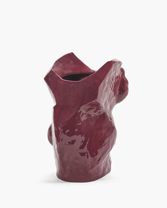 ceramic vase maroon color on white background