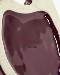 Marni for serax logo on bottom of maroon owl vase