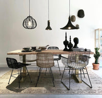 Black metal wire chair in dining room