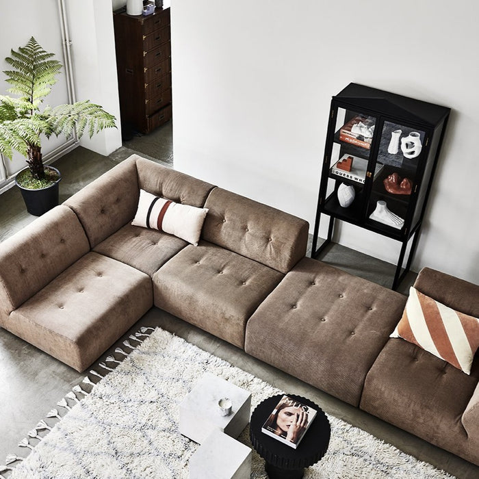element sofa in brown with black showcase cabinet