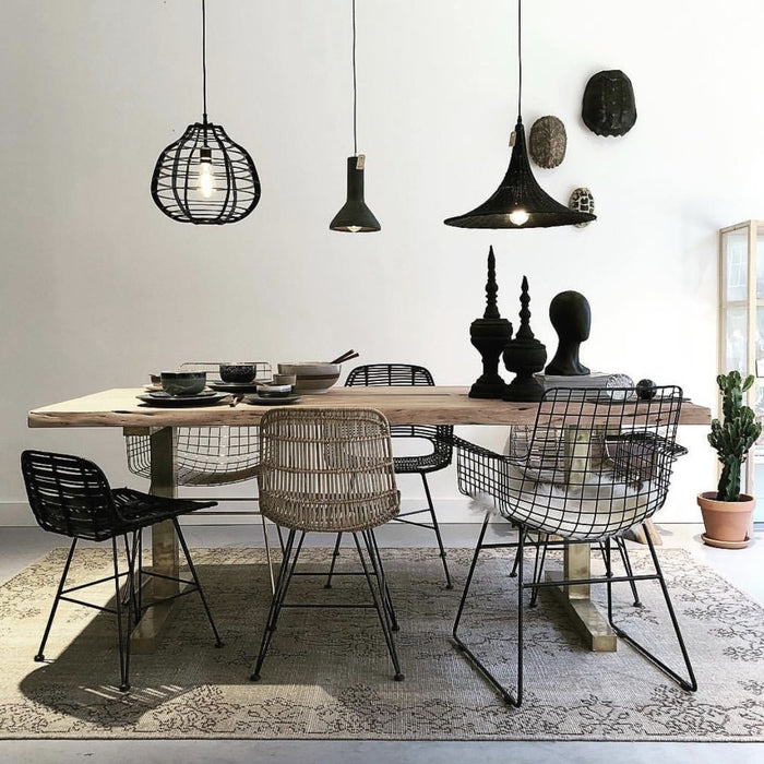 Dining room with all hk living USA chairs and black concrete pendant light fixture