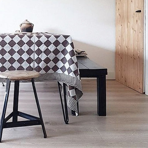 table with traditional Dutch checkered cotton tablecloth